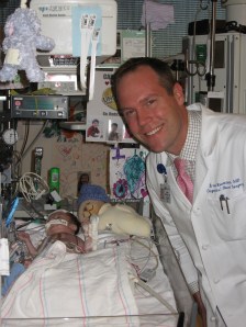 Dr. Reemtsen checking on Rudy