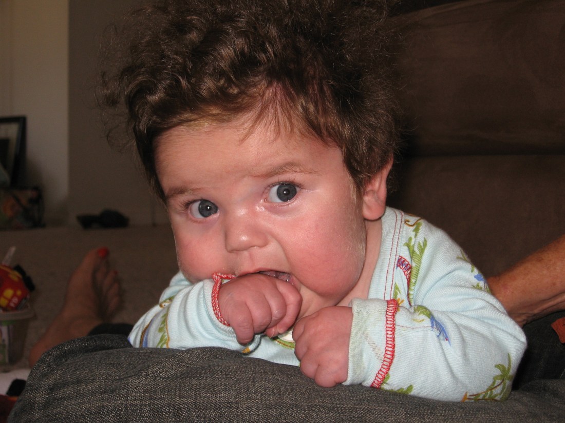 Rudy working on neck control during therapy