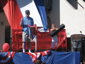 Olivia helping John with the raffle drawing!