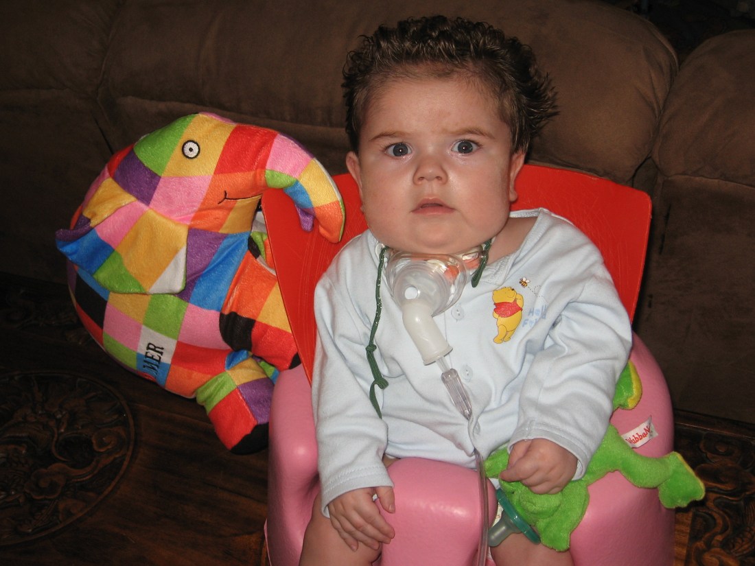 Rudy at 10 months with two favorite toys!