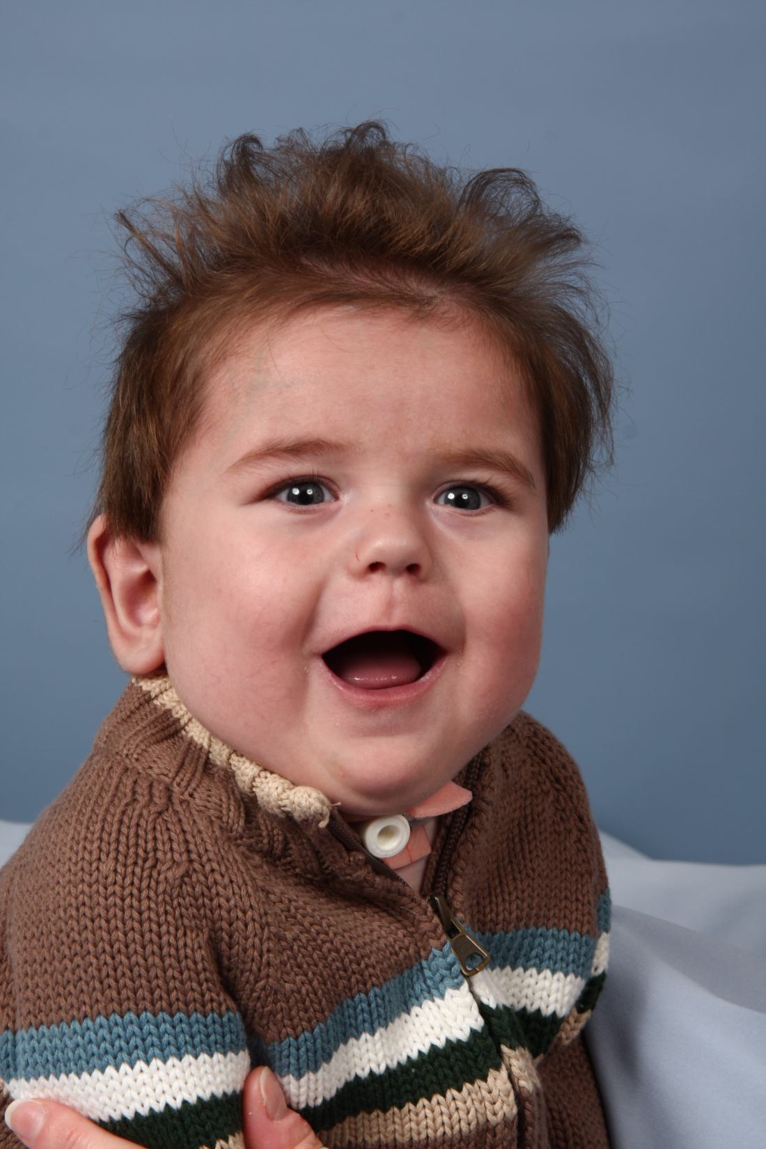 We got it!!  The classic blue backgroud with goofy smile!!  Unfortunately, there was no controlling the hair...I did try!