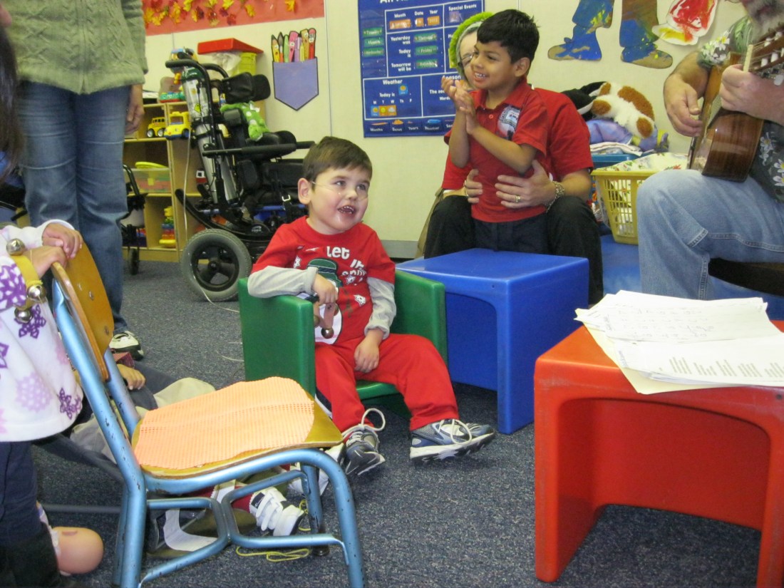 Rudy enjoying a little holiday music at his school party!
