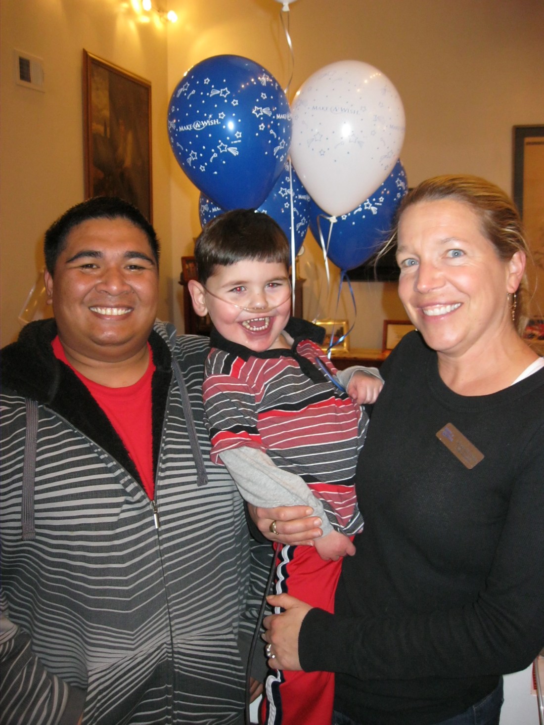 Wish granters Anne and Joseph share the fun with Rudy!