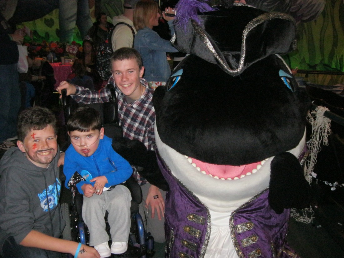 Rudy wasn't too sure about Shamu at the the Pirates & Princesses party...ha