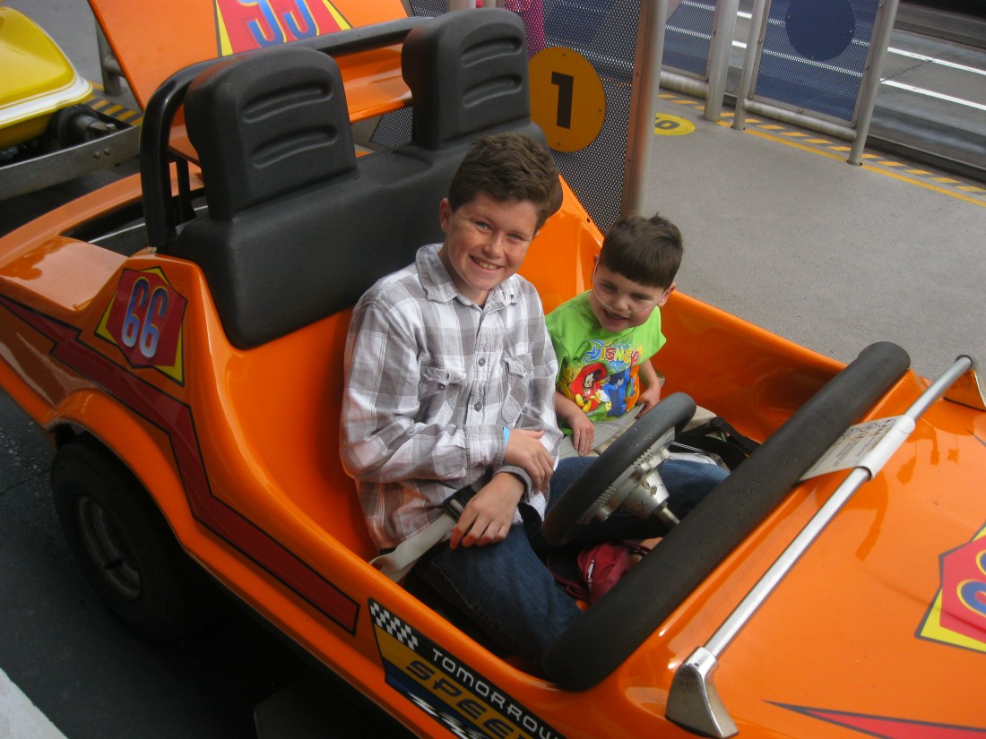 We spent our last "theme" park day at the Magic Kingdom...Rudy REALLY liked the Tomorrowland Speedway!