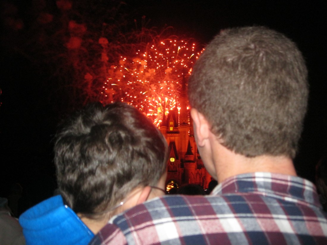 We ended our day with the fireworks show...Wilson held Rudy so he could see...precious.  The fireworks, the music and this image made me cry.  :)