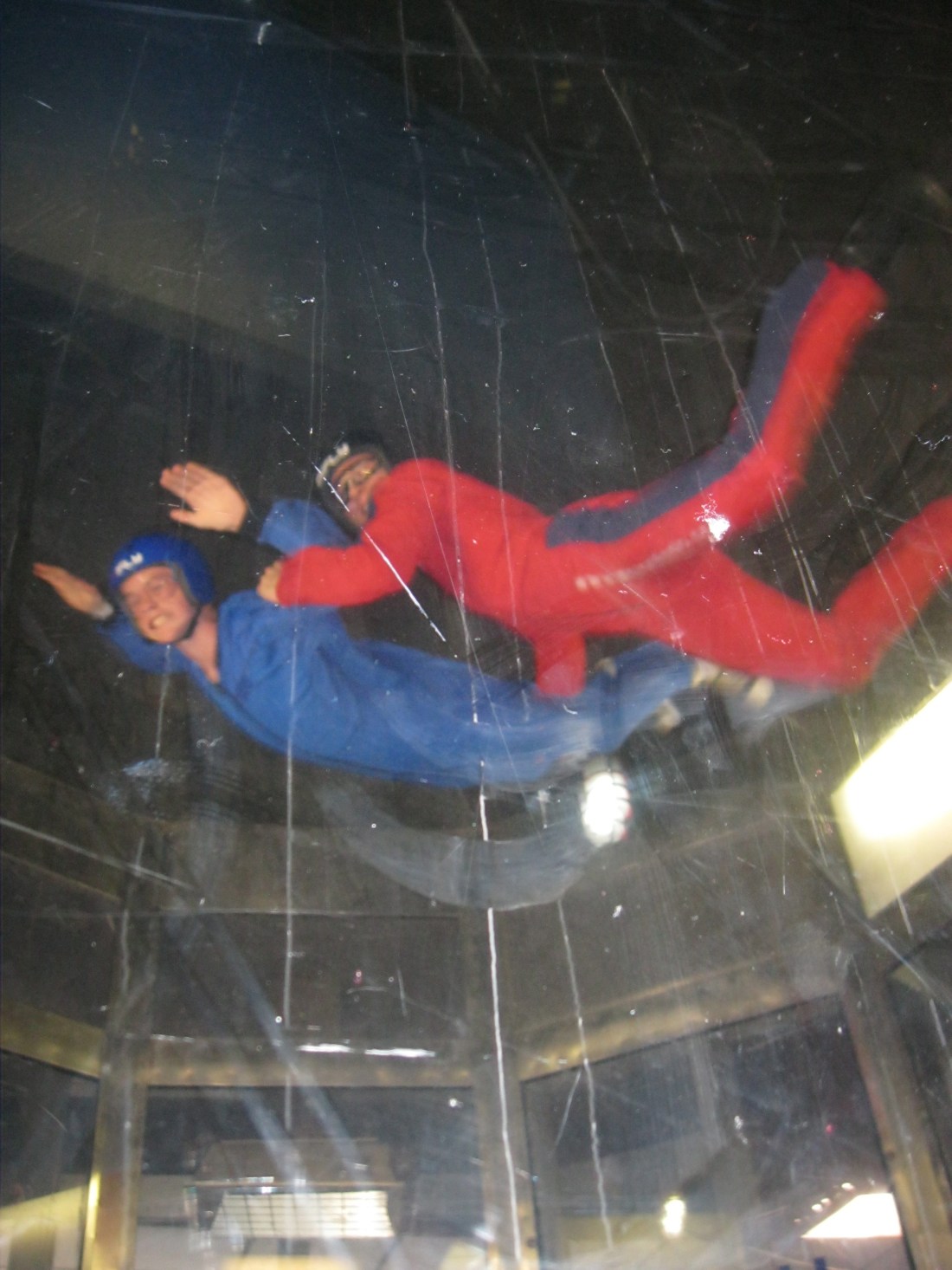 Rudy and I got to watch and it was pretty cool...Wilson flying high with the help of the instructor!