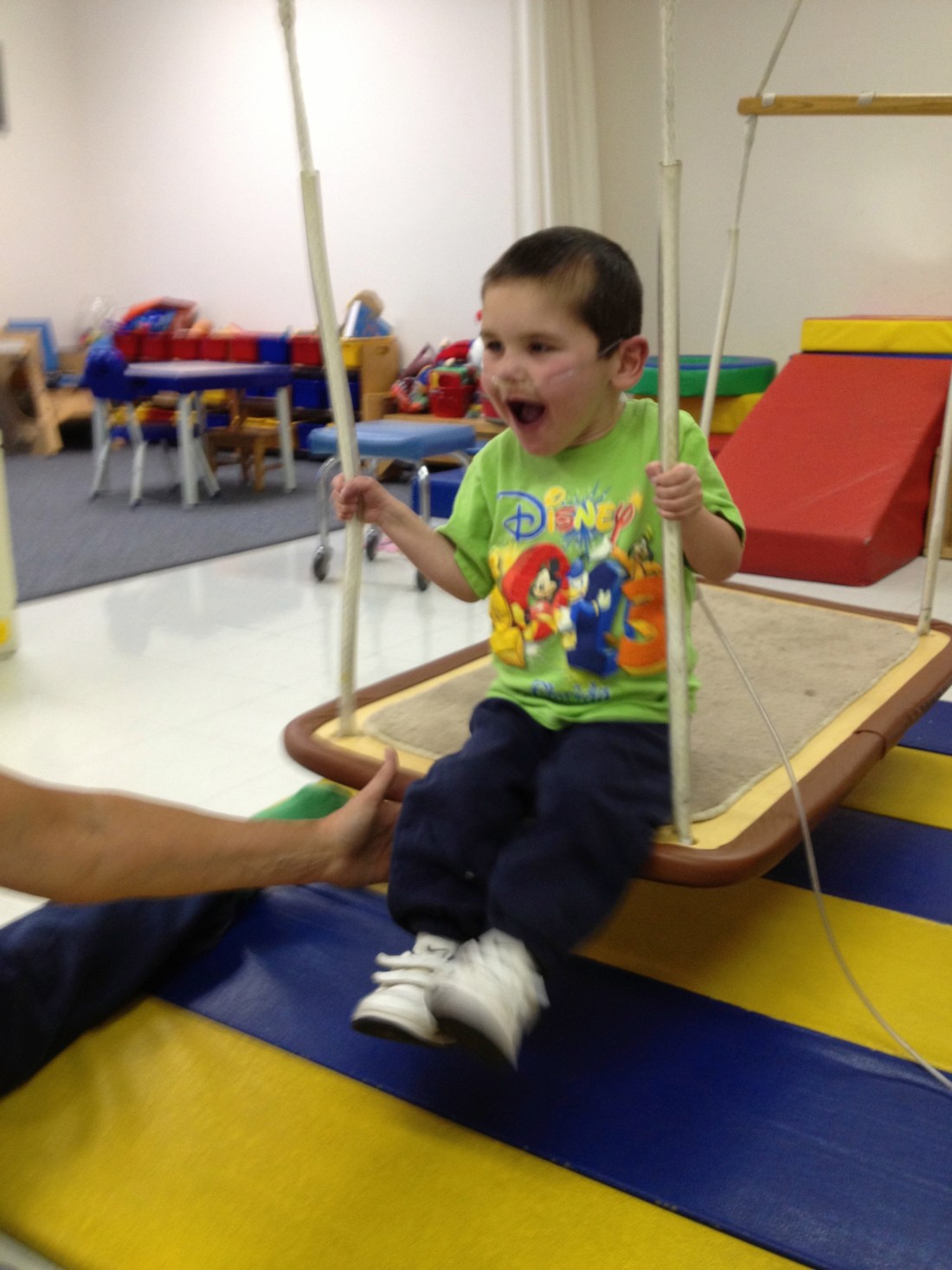 Rudy's new passion in therapy...you can't underestimate the victory in being able to push off, lift your legs up and hold for a really fun ride!!!