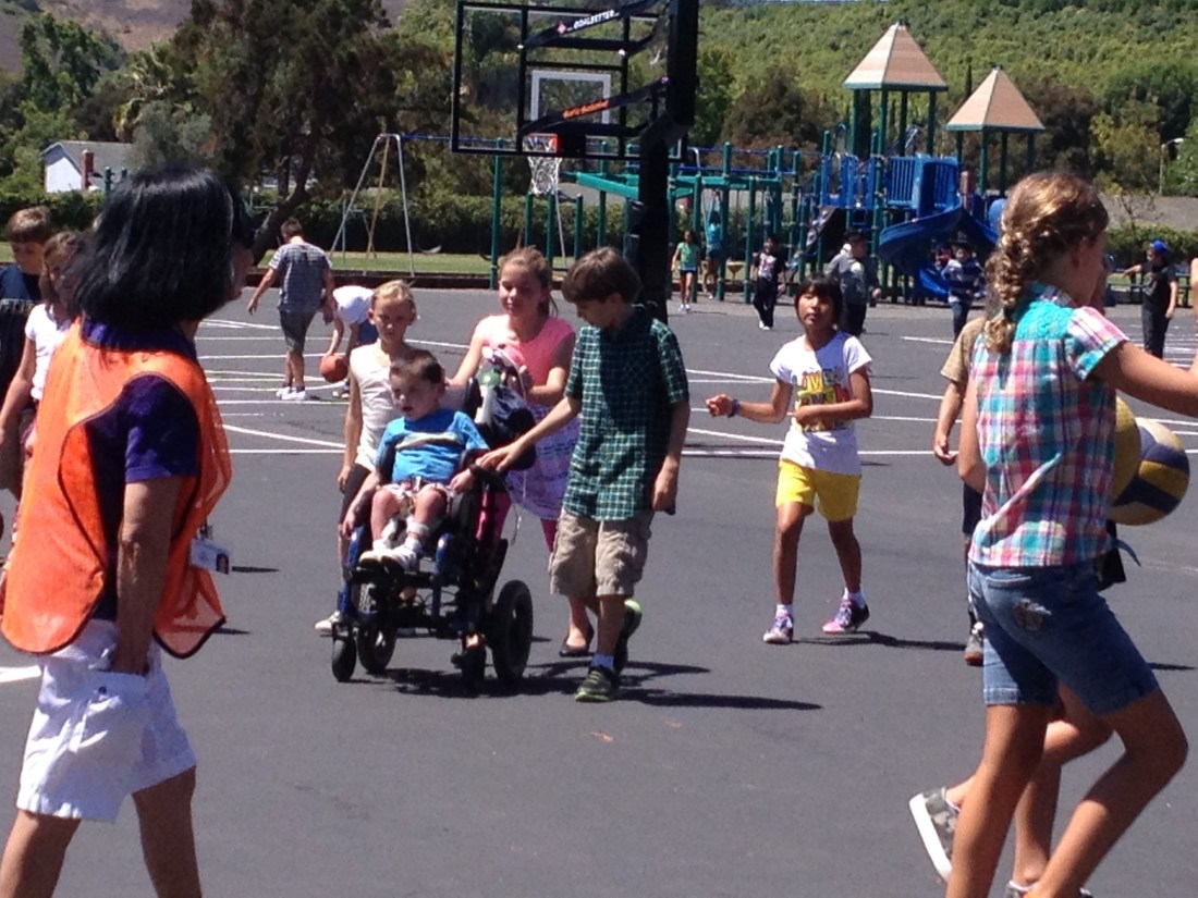 Rudy and I went back to have lunch with Olivia and he ended up making the rounds on the play yard with a posse of his buddies...precious!