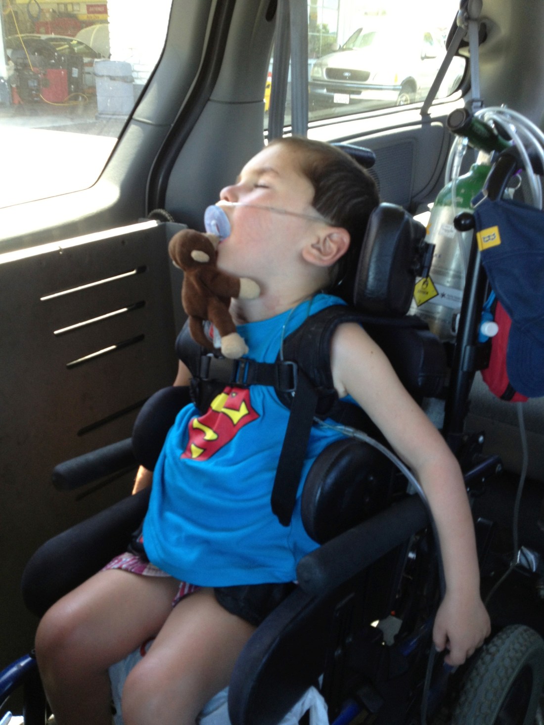 The mark of a good day...asleep in the two minutes it takes to get home!