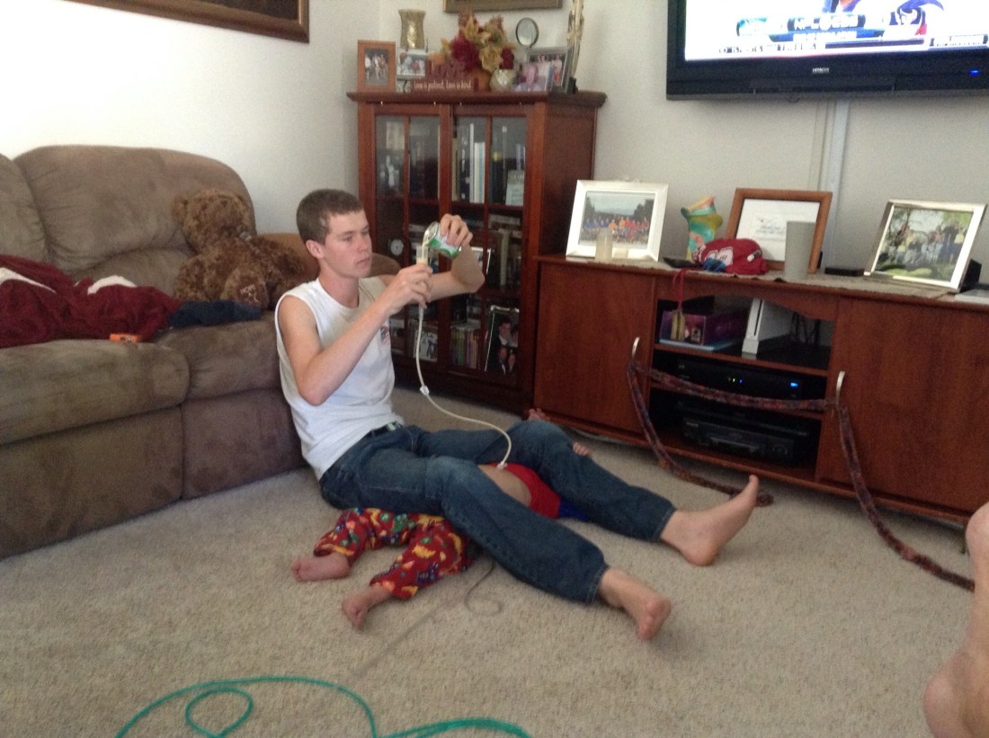 Wilson lending a helping hand...um, actually a helping TWO hands and legs and etc, etc, etc.  Whatever it takes!