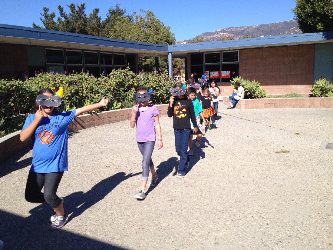 Livy's traditional "hat and mask" parade at school was, once again, super fun!