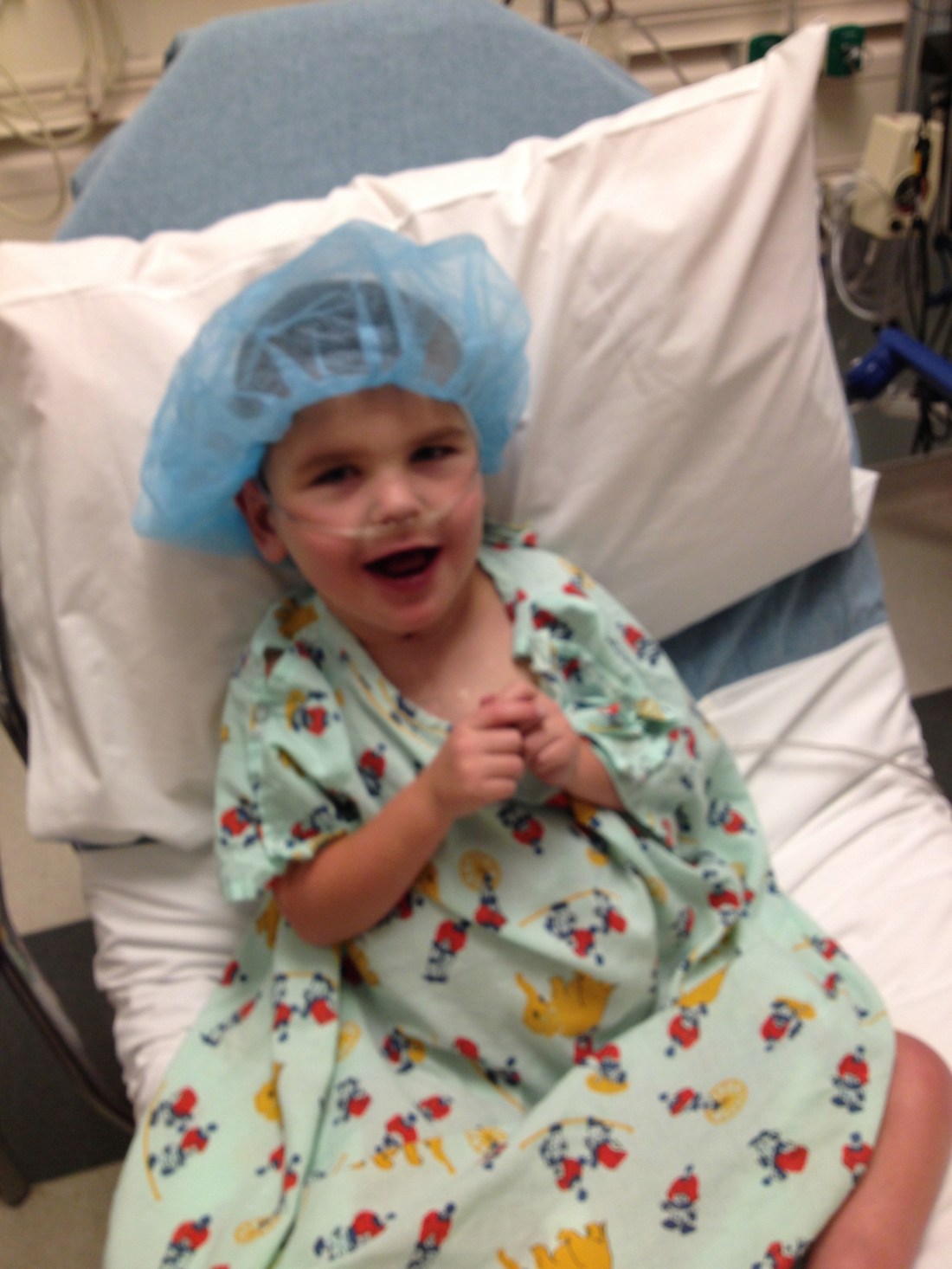 Rudy was all smiles headed into surgery...he didn't need me and went willingly with the team of blue suits who transported him to the OR. :)