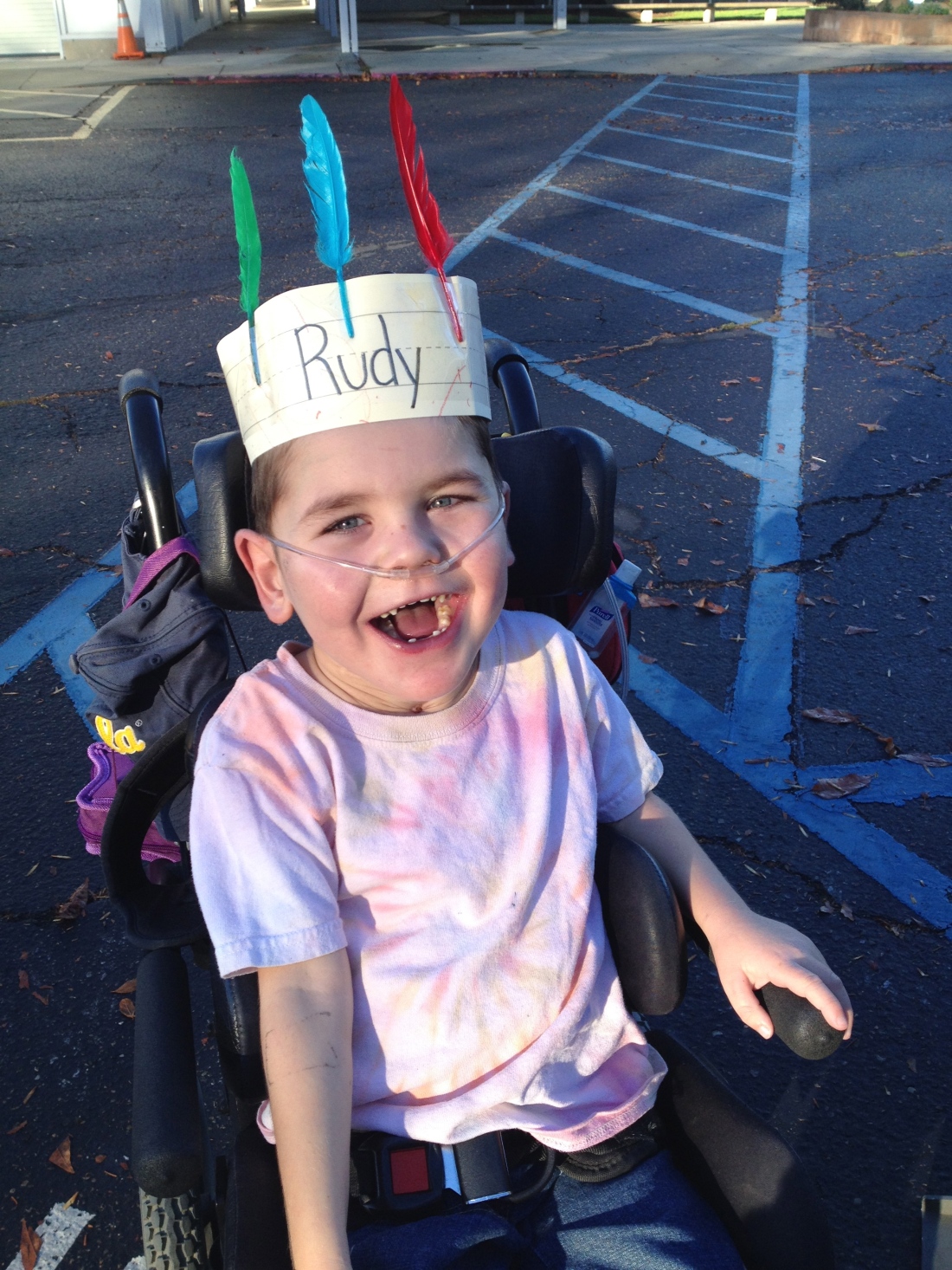 Worth posting again…I'm not sure if Rudy is supposed to be a Native American or a turkey but he's got his trademark "all smile" going on!  :)