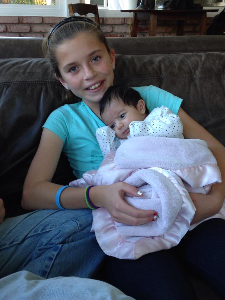 Olivia holding brand new baby Olivia!!