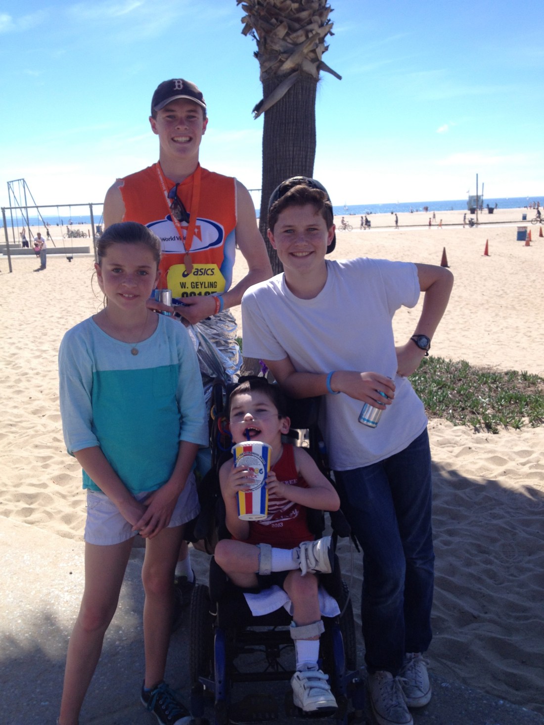 Wilson's 1st 1/2 marathon was a success...the younger sibs were great cheerleaders! 