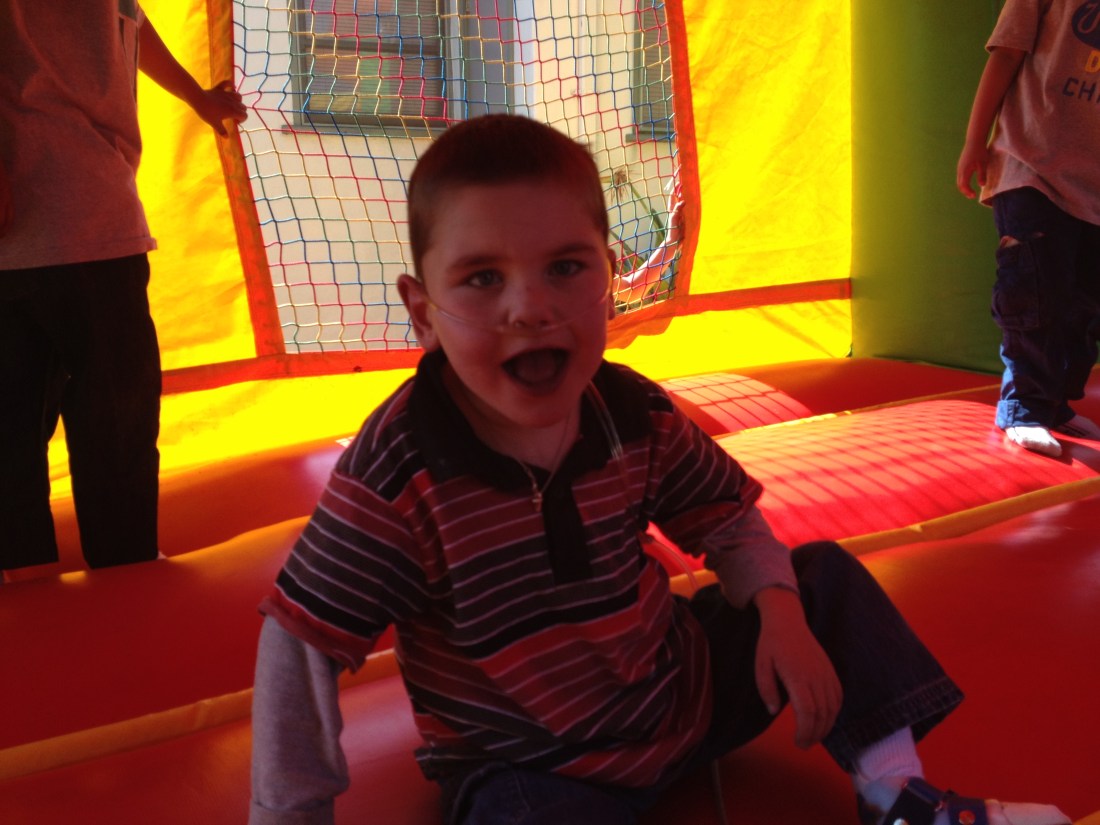 Rudy enjoying the bounce house at a classmate's bday party...
