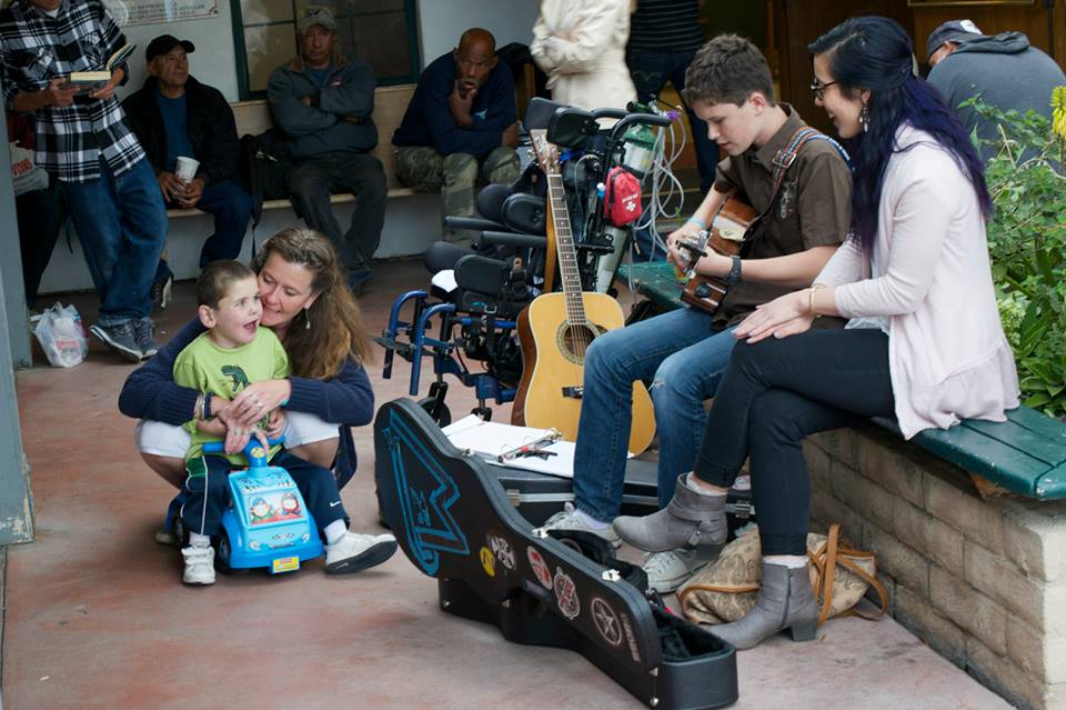 Easter Feast at the Rescue Mission...playing and singing for the homeless guests in the courtyard as they waited...Max and I loved having Olivia (a student from Westmont) join us!