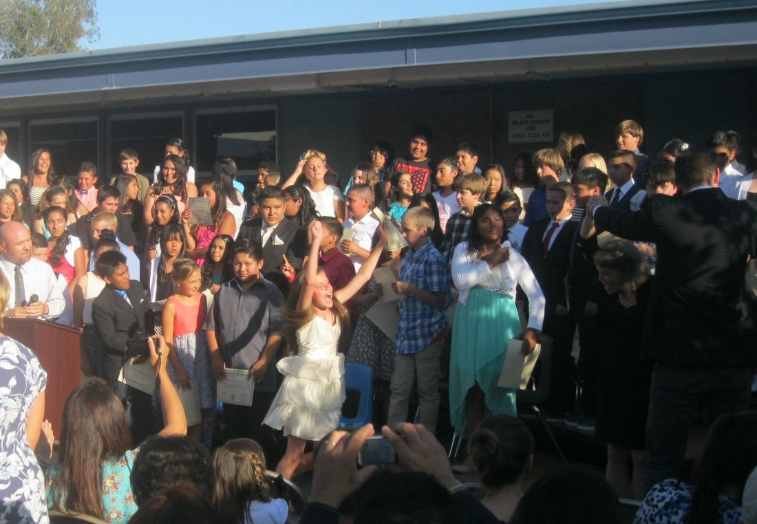 Time to celebrate!  Olivia was the first one through the "tunnel of victory" made by the teachers!!