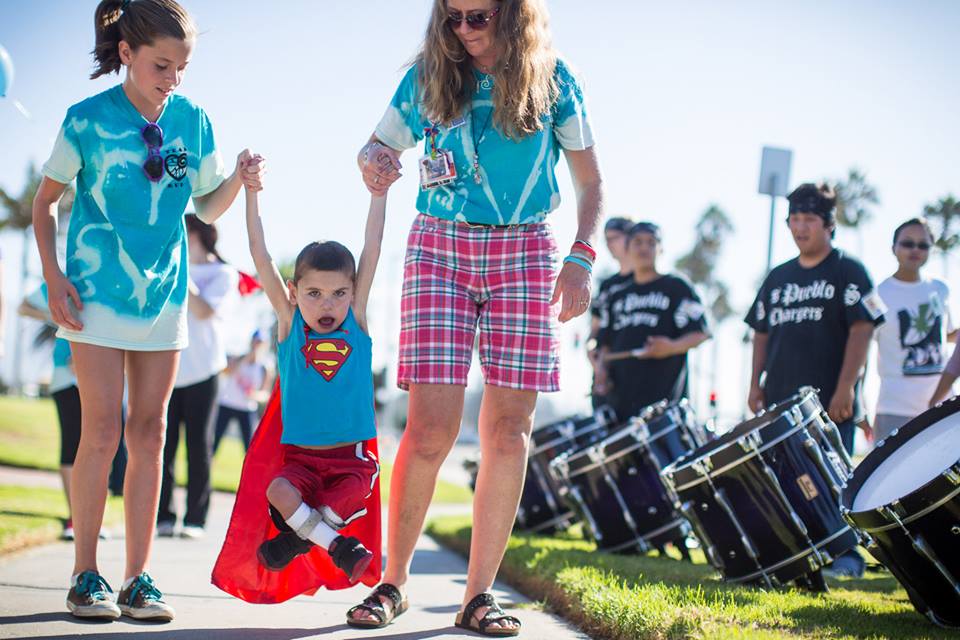 NOPE!!  Rudy protested by refusing to put his feet down when Livy and I tried to help him along!!!