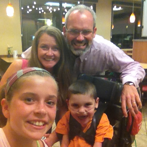 After a quick dinner for the rest of us, Olivia babysat Rudy all by herself so Rolf and I could go to the dance and escort Wilson during the crowning of the king ceremony!  She bathed him, g-tube fed him and gave him his meds!! Well done Liv!!!