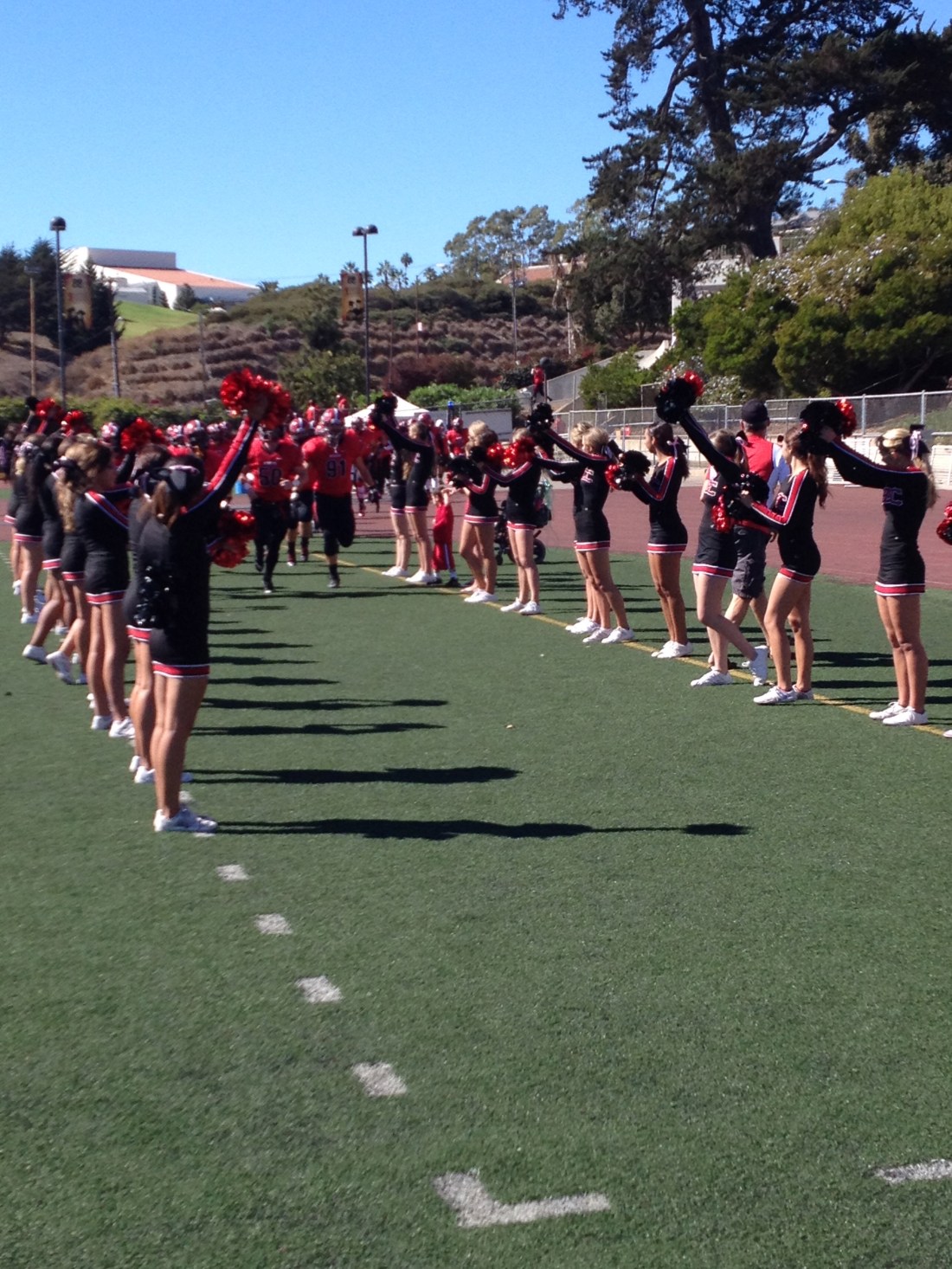 Where's Rudy? Can you see him welcoming the players onto the field?
