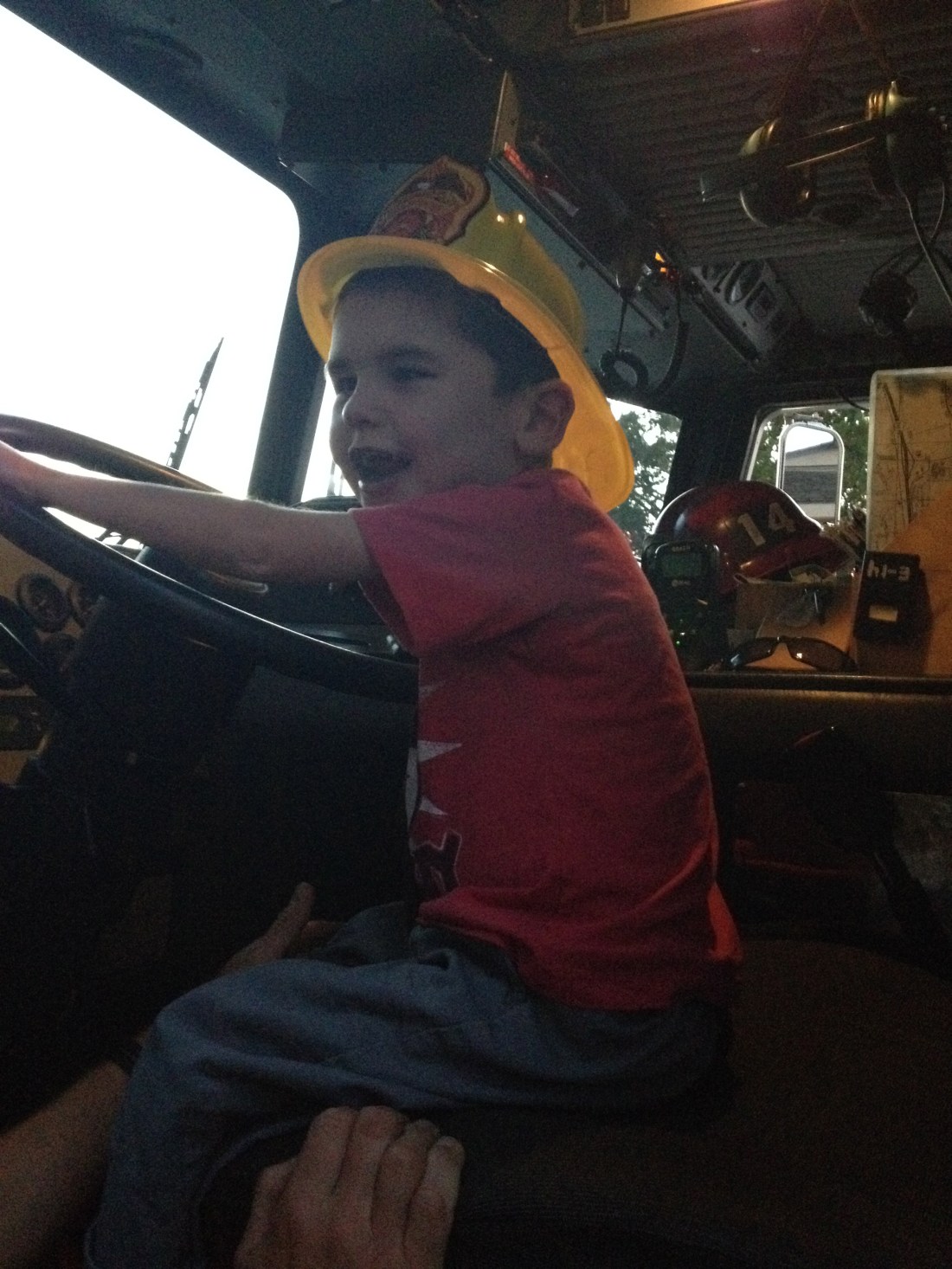 A visit to our neighborhood fire station to drop off some treats led to a turn in the engineer's seat!!  Woo Hoo!