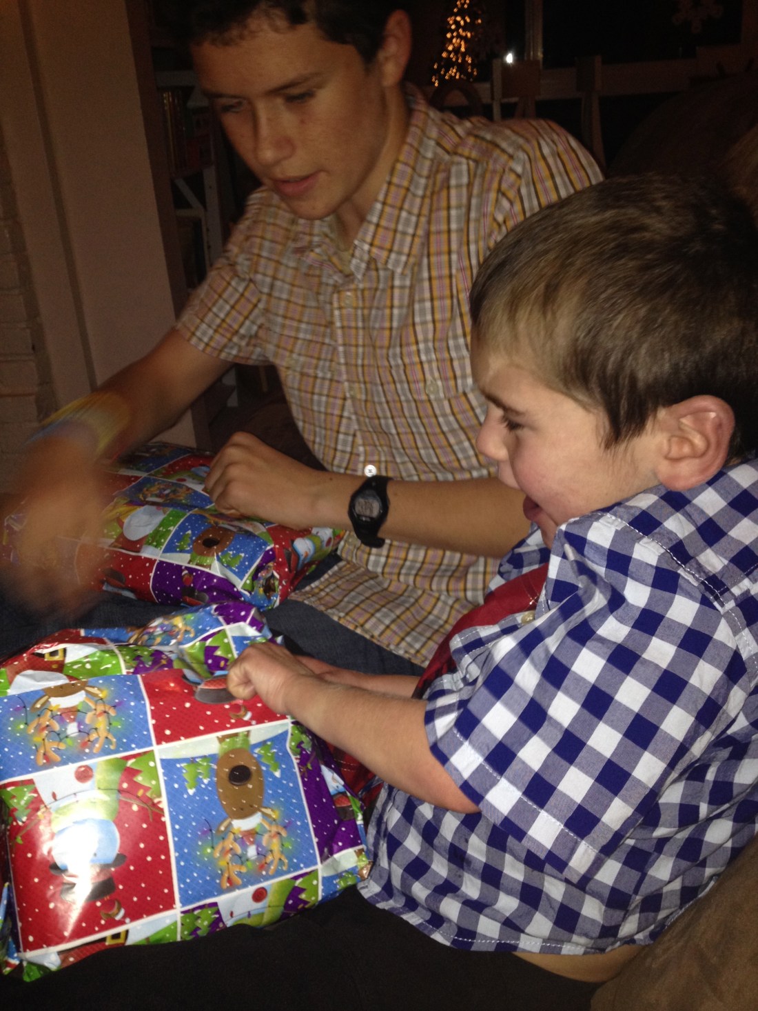 Opening the traditional Christmas eve gift of pajamas!