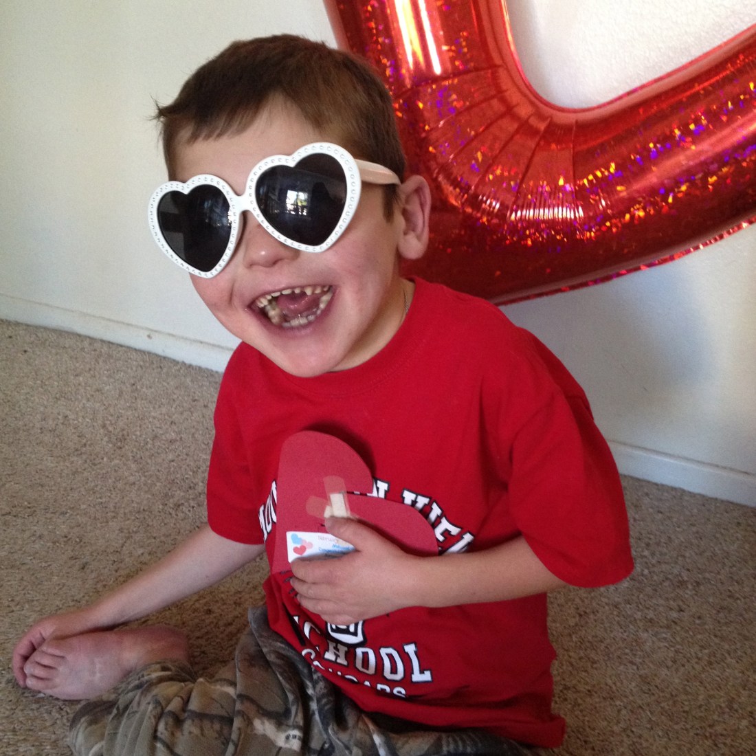 Rudy showing off his "mended heart" magnet.