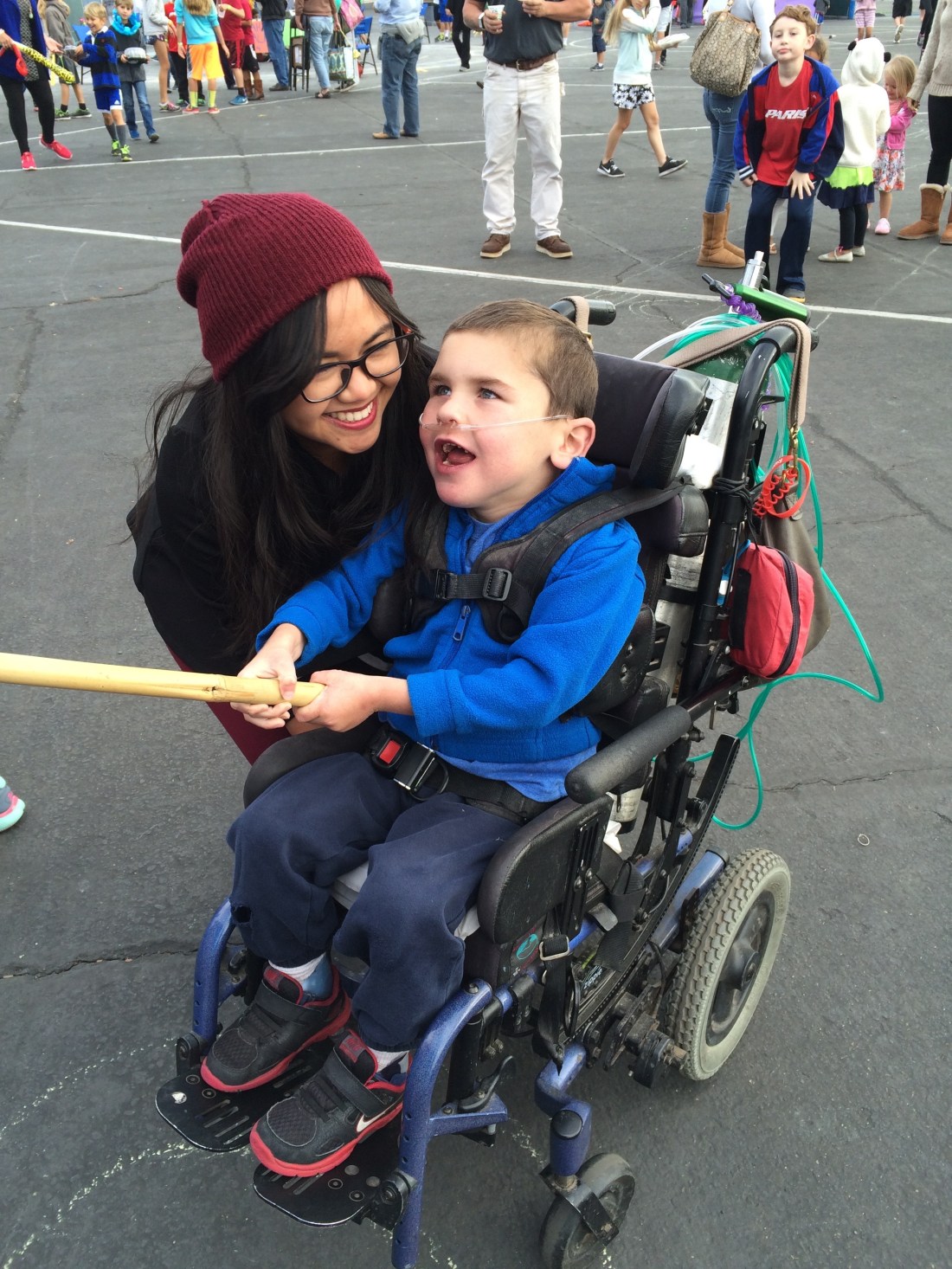 Nurse Jomana was sweet to show up at Rudy's school carnival and he enjoyed "fishing" for prizes at the fishing pond most!  :)