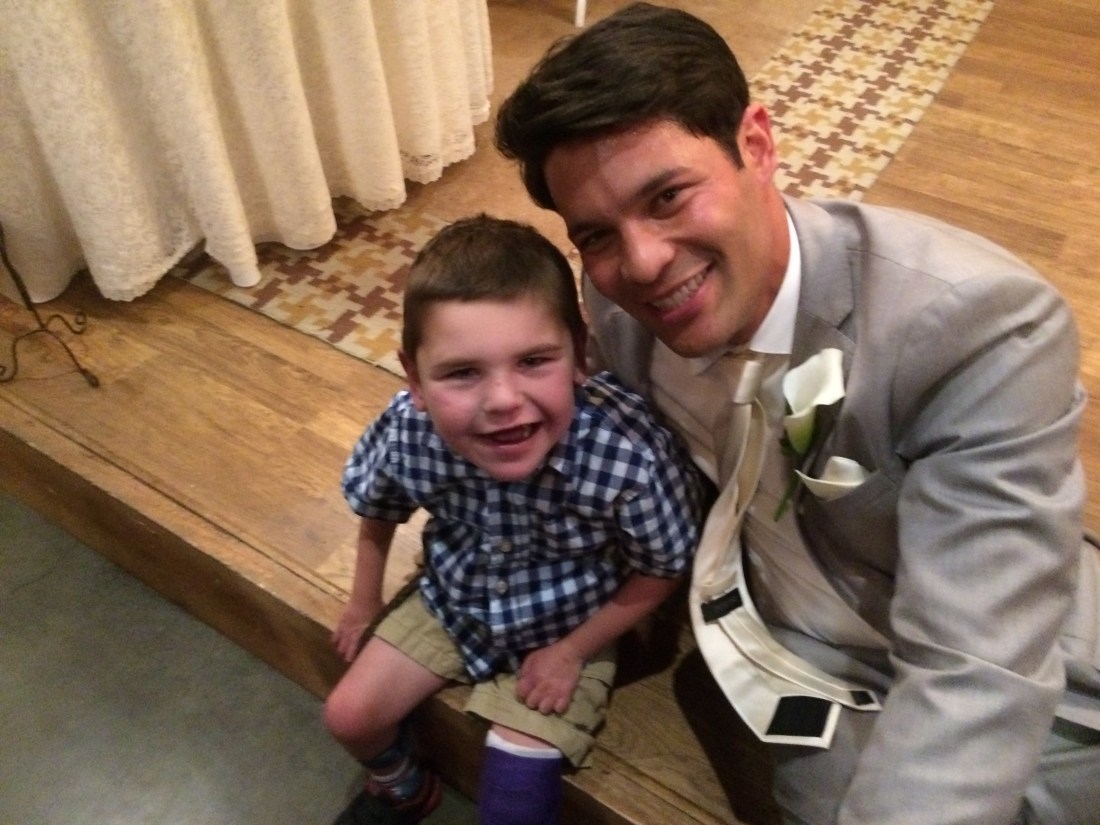Rudy hadn't quite mastered walking with his cast yet so he had to skip the dancing this wedding but he had fun celebrating Pastor Aaron and his new bride Paige nonetheless!!  Woo Hoo!!  :)