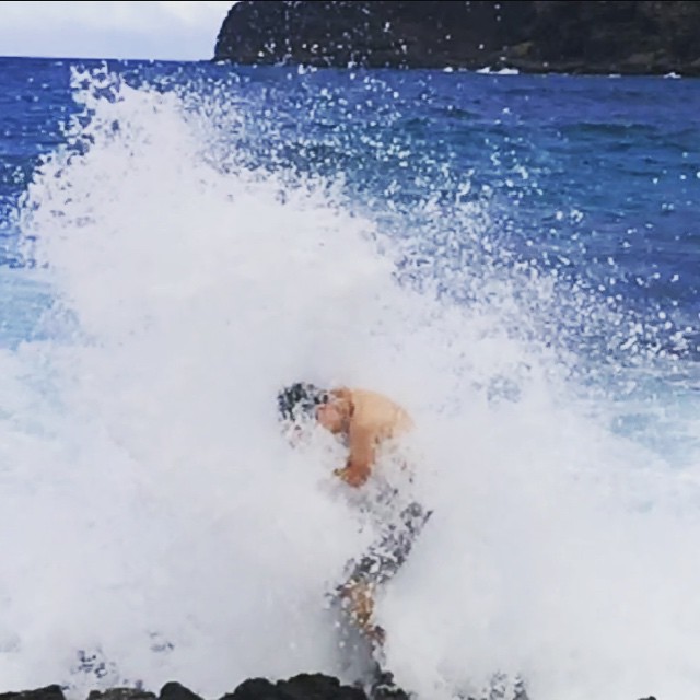 We didn't get a picture of the boys parasailing but Wilson did capture Max getting blasted and almost swept to his death by this wave!