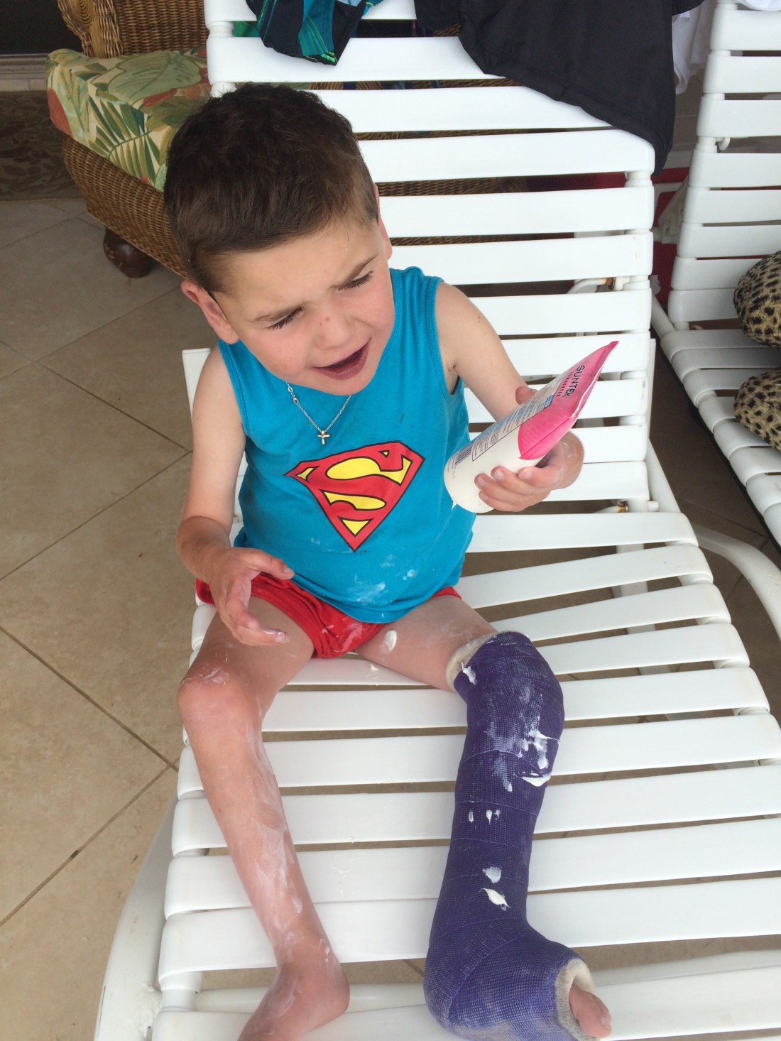 Rudy's been working on "self care" in OT so while the others were out flying the friendly skies, I gave Rudy the tube of sunscreen and asked him to put it on...ha, ha!  Not bad Rudy!