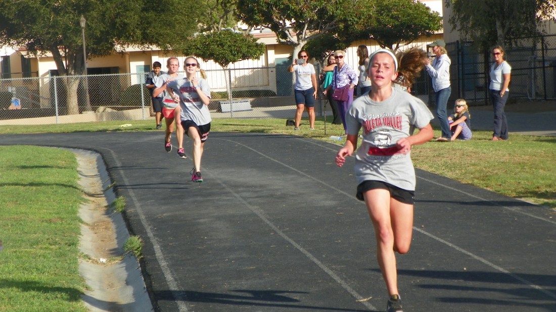 Later on Thursday, Mascot Rudy attended Olivia's 2nd cross country meet and gave the boys and girls fist bumps before their races. Woo Hoo! Go Mariners!