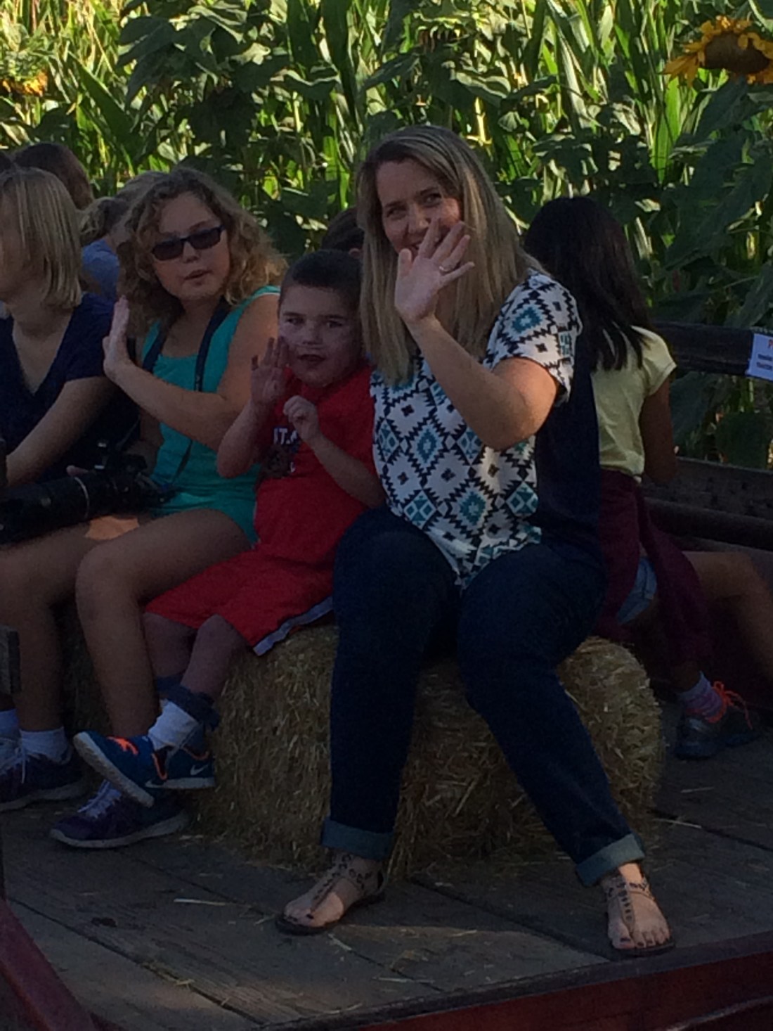 Rudy and Nurse Sara and big buddies having fun on the hay ride.