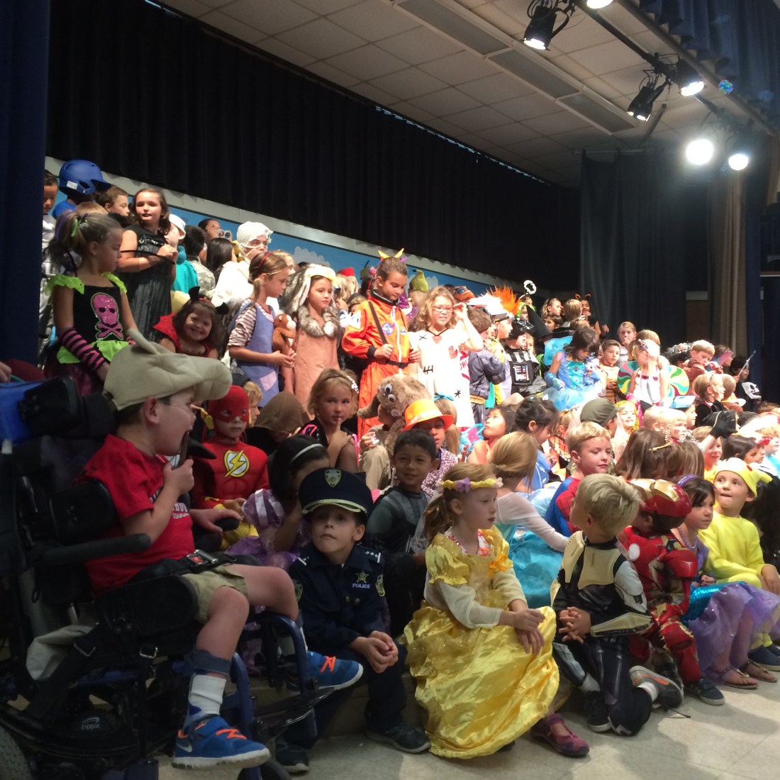 Rudy who participates 110% during music class wouldn't sing during his school Halloween Sing but he did sit patiently and quietly while he waited for grades K-3 sing through their repertoire! (Slow but steady progress! Ha Ha)