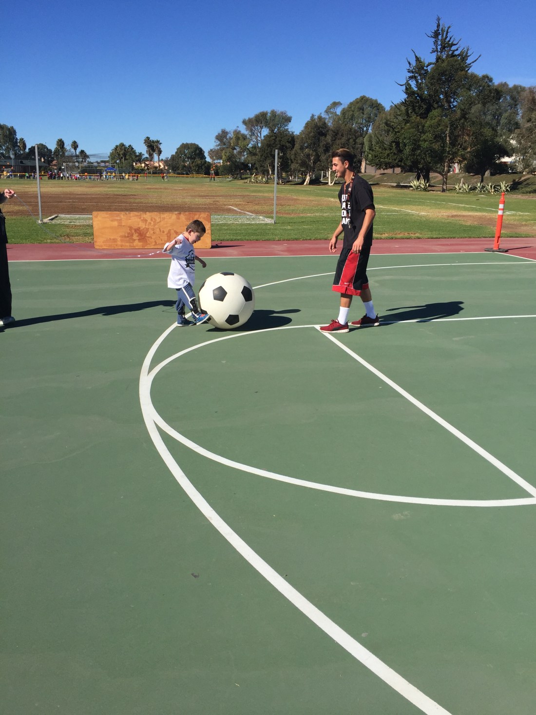 Warming up with volunteer Spencer...