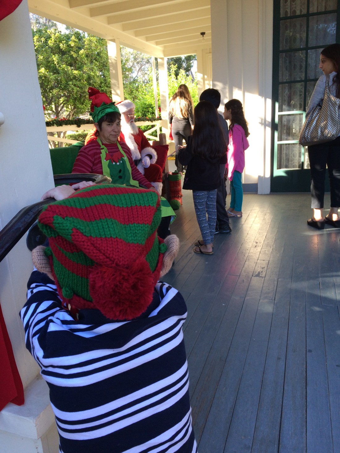 Rudy studying Santa hard right before it was his turn to say hi.