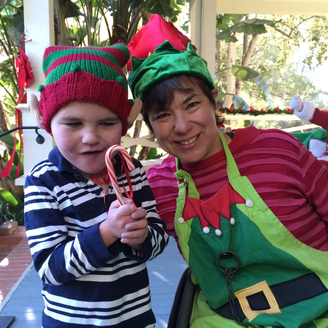 Rudy having fun with fellow elf Emily.